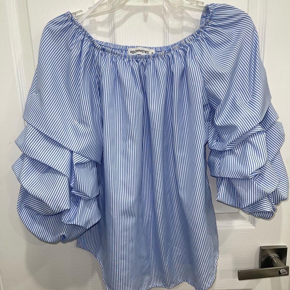 Striped blue and white blouse.